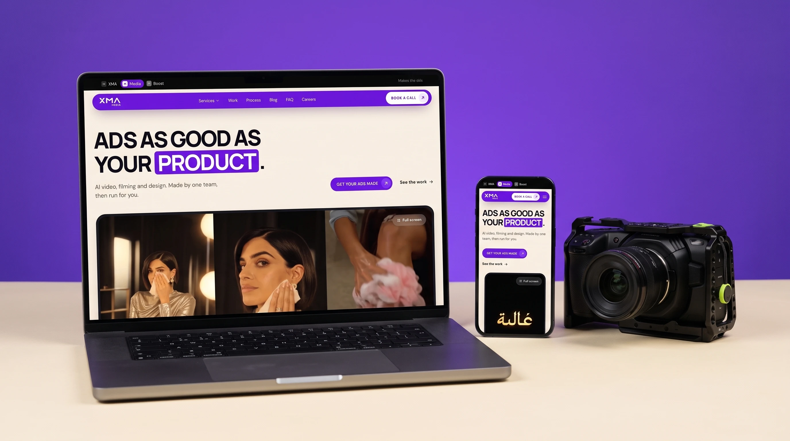 The XMA Media website on a laptop and a phone beside a cinema camera, against a violet backdrop